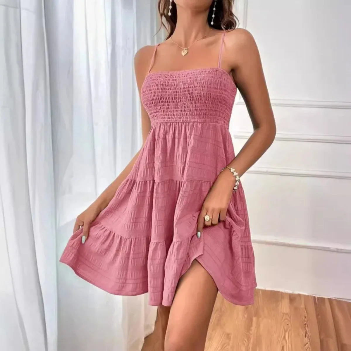 Vestido mini con volantes
