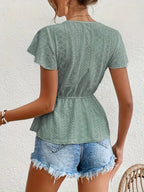 Top con cuello volante