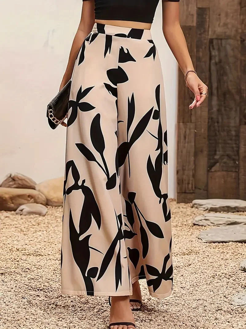Pantalón amplio con estampado de hojas