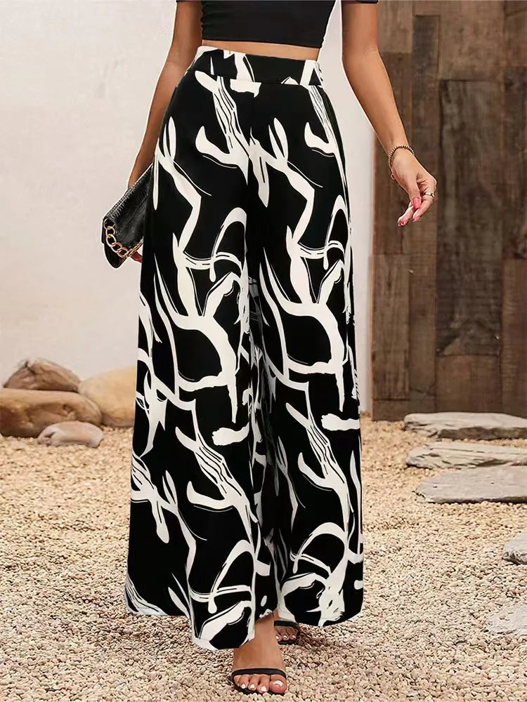 Pantalón amplio con estampado de hojas