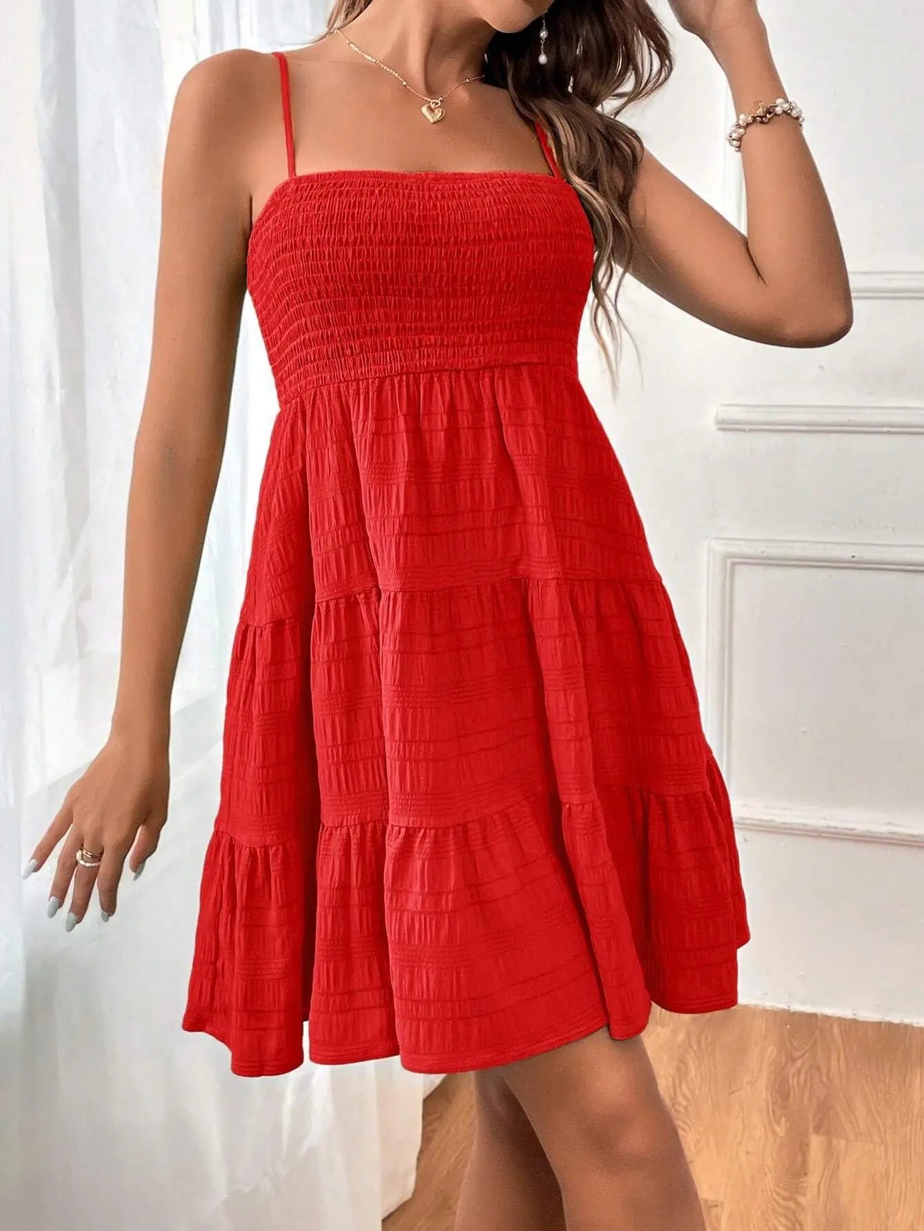 Vestido mini con volantes
