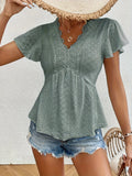 Top con cuello volante