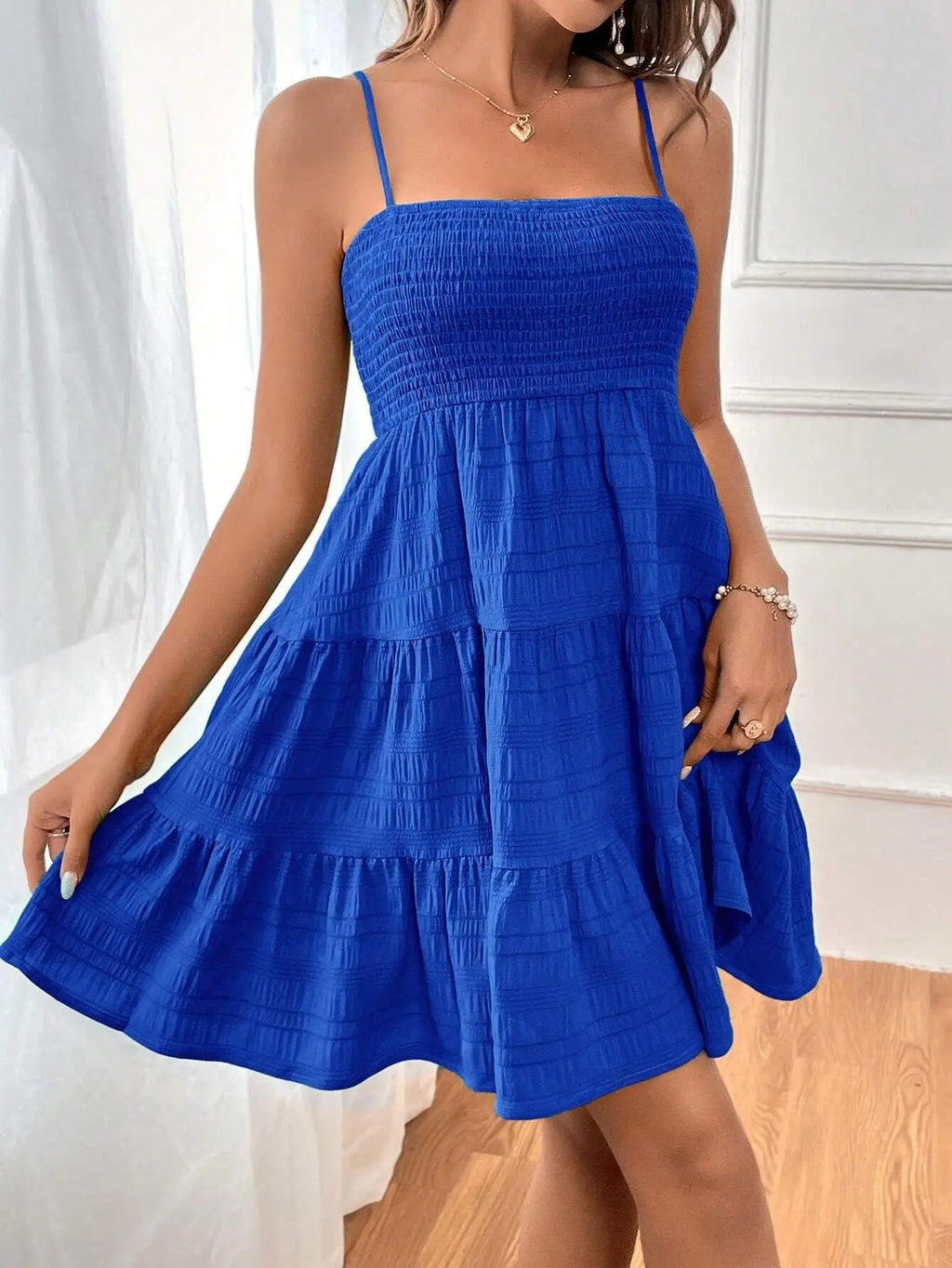 Vestido mini con volantes