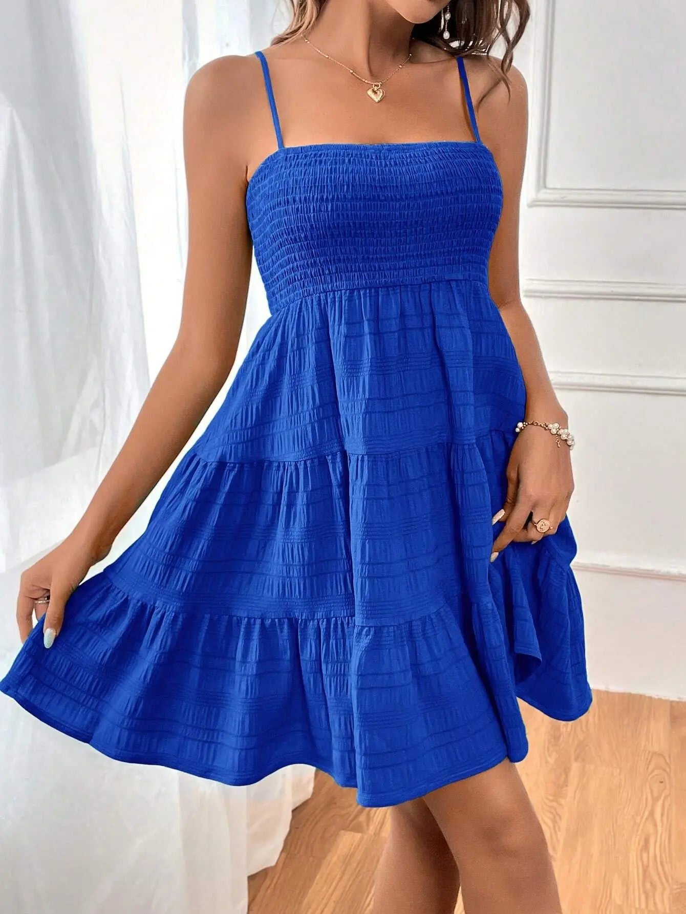 Vestido mini con volantes